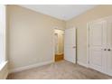 Bright bedroom with neutral walls and hardwood floors at 624 Bonaventure Dr. # 202, Myrtle Beach, SC 29572