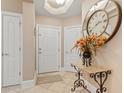 Elegant entryway with a large clock and decorative console table at 2180 Waterview Dr. # 634, North Myrtle Beach, SC 29582