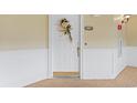 Condo entry with white door and decorative wreath at 2180 Waterview Dr. # 634, North Myrtle Beach, SC 29582