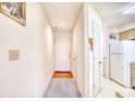 Simple entryway with carpet, tile, and doors to kitchen and bedrooms at 4103 Pinehurst Circle # Bb-12, Little River, SC 29566