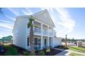 Two-story house with front porch and walkway at 7014 Shooting Star Way, Myrtle Beach, SC 29579