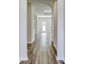 Bright and airy entryway with wood-look flooring at 331 Dunlin Pl, Conway, SC 29526