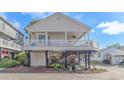 Elevated beach home with carport and deck at 6001-1889 S Kings Hwy., Myrtle Beach, SC 29575