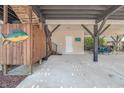 Outdoor shower, patio seating, and exterior access to the home at 6001-1889 S Kings Hwy., Myrtle Beach, SC 29575