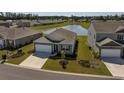 Aerial view of a house near a pond in a quiet neighborhood at 238 Marauder Dr., Longs, SC 29568