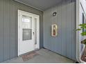 White front door with a welcome mat at 1930 Bent Grass Dr. # 40K, Surfside Beach, SC 29575