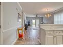 Open concept living room and kitchen with hardwood floors at 800 Crumpet Ct. # 1122, Myrtle Beach, SC 29579