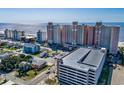 Oceanfront property view with parking and neighboring buildings at 2701 S Ocean Blvd. # 903, North Myrtle Beach, SC 29582