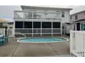Inviting kidney-shaped pool with a surrounding patio at 329 54Th Ave. N, North Myrtle Beach, SC 29582