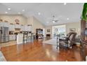 Open concept kitchen and living area with hardwood floors at 1459 Tiger Grand Dr., Conway, SC 29526