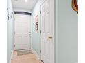 Bright hallway with tile flooring and access to other rooms at 9550 Dunes Gable Dr. # A, Myrtle Beach, SC 29572