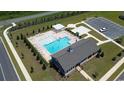 Aerial view of community pool with lounge chairs and gazebo at 176 Country Grove Way, Galivants Ferry, SC 29544