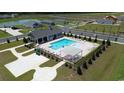 Aerial view of community pool with lounge chairs and gazebo at 176 Country Grove Way, Galivants Ferry, SC 29544