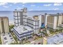 Aerial view of oceanfront resort building and surrounding area at 5308 N Ocean Blvd. # 812, Myrtle Beach, SC 29577