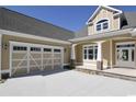 Two-car garage with white and tan accents at 1100 Maccoa Dr., Conway, SC 29526
