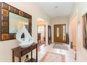 Spacious entryway with tile flooring and decorative accents at 355 Foxtail Dr., Longs, SC 29568