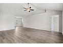 Spacious living room with vinyl flooring and high ceilings at 702 Lightwood Dr., Conway, SC 29526