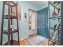 Inviting entryway with wood floors and built-in shelving at 6458 Sweet Gum Trail, Myrtle Beach, SC 29588