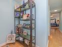 Bright hallway with wood floors and Gathering photos at 6458 Sweet Gum Trail, Myrtle Beach, SC 29588