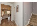 Elegant staircase with carpet runner leading upstairs at 1109 Dalmore Ct., Conway, SC 29526