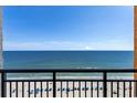 Breathtaking ocean view from a balcony, showcasing a sandy beach and blue waters at 1501 S Ocean Blvd. # 1235, Myrtle Beach, SC 29577
