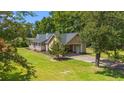 House exterior with carport and landscaping at 4935 Meadow St., Loris, SC 29569