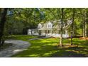 Two story home nestled on a wooded lot at 3758 Loblolly Ave., Little River, SC 29566