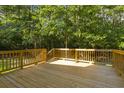 Spacious deck overlooking a wooded backyard at 3758 Loblolly Ave., Little River, SC 29566