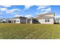 Two-story house with beige siding and screened porch at 357 Glacier Way, Conway, SC 29526