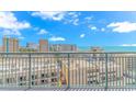 Ocean view from a condo balcony overlooking the coastline and buildings at 201 74Th Ave. N # 1002, Myrtle Beach, SC 29572