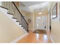 Bright entryway with hardwood floors and staircase at 4341 Parkland Dr., Myrtle Beach, SC 29579