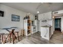 Efficient kitchen with white cabinets and appliances at 116 South Waccamaw Dr. # 204, Garden City Beach, SC 29576