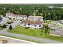 Apartment complex situated in a wooded area near a golf course at 124 South Shore Blvd. # 303, Longs, SC 29568