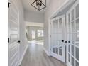 Light and airy foyer with hardwood floors and french doors leading to an office at 181 Azure Loop, Myrtle Beach, SC 29588