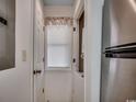 Small laundry area with washer, dryer, and window for ventilation at 4103 Pinehurst Circle # Bb-11, Little River, SC 29566
