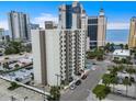 Aerial view of a high rise building with ocean views and parking at 400 20Th Ave. N # 405, Myrtle Beach, SC 29577