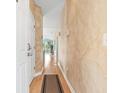 Light and bright hallway with wood floors and neutral walls at 624 River Oaks Dr. # 52G, Myrtle Beach, SC 29579