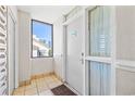 Condo entry with tiled floor, door and window overlooking the city at 210 75Th Ave. N # 4045, Myrtle Beach, SC 29572