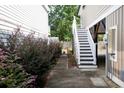 Landscaped walkway leads to a staircase up to the house at 1517 Schooner Ct., Garden City Beach, SC 29576