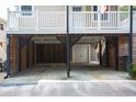 Covered parking under the house, offering protection from the elements at 1517 Schooner Ct., Garden City Beach, SC 29576