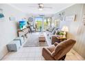 Bright living room with ocean view, comfy seating, and coastal decor at 6302 Ocean Blvd. N # E-1, North Myrtle Beach, SC 29582