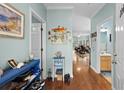 Open entryway with views of living room and bathroom at 5882 Longwood Dr. # 204, Murrells Inlet, SC 29576