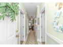 Bright hallway with access to multiple rooms at 4516 N Plantation Harbour Dr. # H-12, Little River, SC 29566