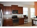 Modern kitchen with stainless steel appliances and granite countertops at 1098 University Forest Dr., Conway, SC 29526