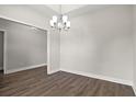 Bright dining room featuring hardwood floors and a chandelier at 6033 Flossie Rd., Conway, SC 29527