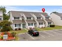 Townhouse complex with parking and landscaping at 500 Deer Creek Rd. # D, Surfside Beach, SC 29575