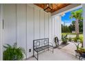 Front entry with wooden bench and decorative accents at 125B Lydia Lane # B, Pawleys Island, SC 29585