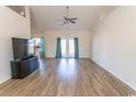 Bright living room featuring hardwood floors and access to backyard at 1417 Tiger Grand Dr., Conway, SC 29526
