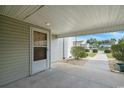 Condo entry with covered walkway leading to the pool area at 1960 C Bent Grass Dr. # C, Surfside Beach, SC 29575