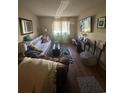 Living room with sofa, TV, and wood flooring at 3555 Highway 544 # 2D, Conway, SC 29526